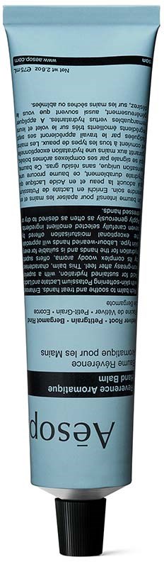 Kleine Tube mit der Aufschrift 'Aesop' in Schwarz-Weiß-Design, wahrscheinlich ein Hautpflege- oder Kosmetikprodukt.