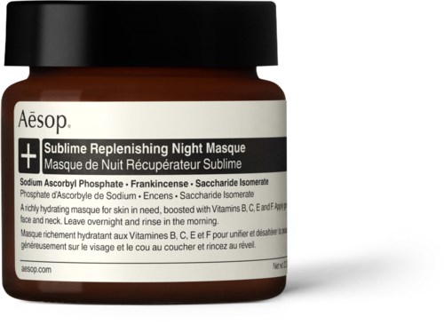 Ein Tiegel von Aesop mit schwarzem Deckel, weißem Etikett und Produktdetails.
