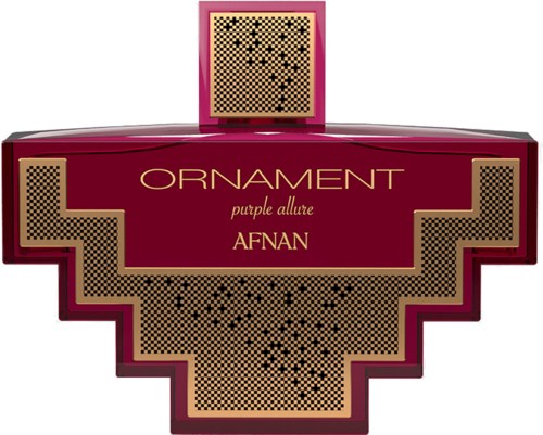 It's a box shaped like a cross, with pink and gold colors, labeled "ORNAMENT" and "AFNAN," with decorative patterns.