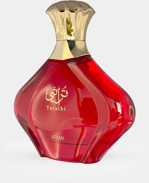 A red perfume bottle with a gold cap, labeled "Turathi" and "AFNAN".