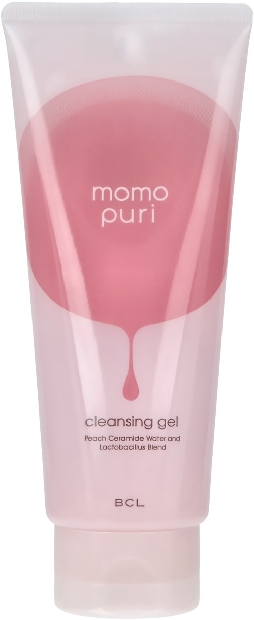 Eine rosa Tube mit Reinigungs-Gel, mit Pfirsichform-Design, kennzeichnet 'momo puri' und 'BCL,' enthält Pfirsich-Ceramid-Wasser und Probiotika.