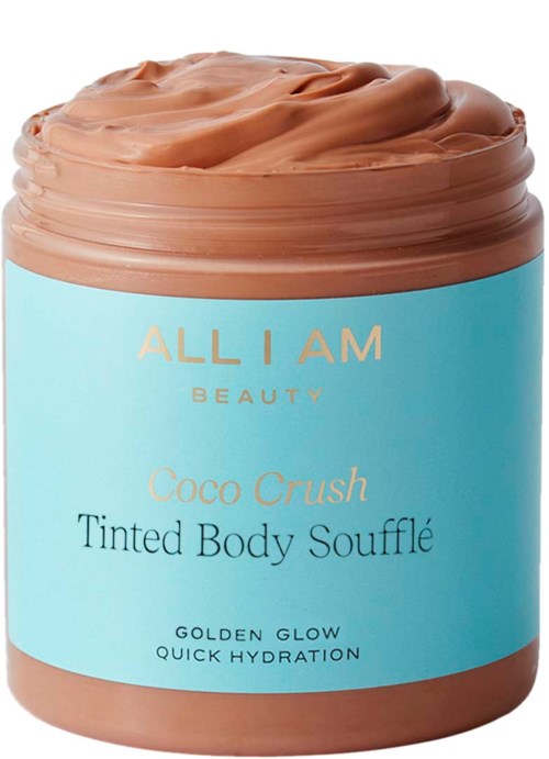 A jar of body lotion with light brown cream, blue label, and gold lettering. It promotes quick hydration and glow.