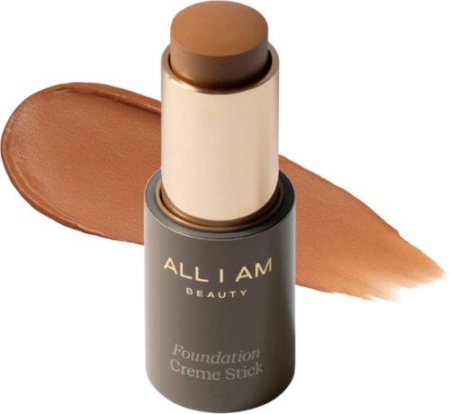 A foundation stick from Alliam Beauty with a swatch of beige color behind it.