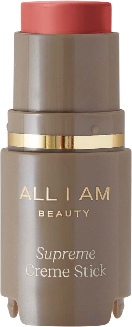 A beige stick with a pink top, labeled 'ALL I AM BEAUTY Supreme Creme Stick'.