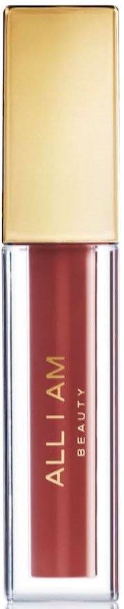 A lipstick bottle with a gold cap shows the color of the lipstick inside, which is a reddish-brown shade.
