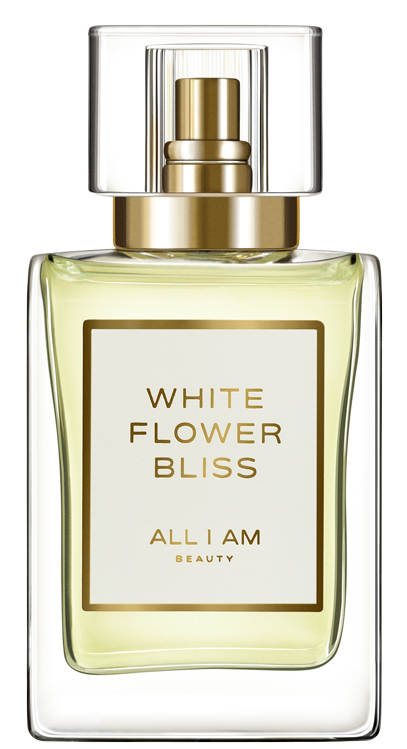 Een parfumfles met label 'White Flower Bliss' met een doorzichtige dop en gouden accenten, gevuld met lichtgele vloeistof.