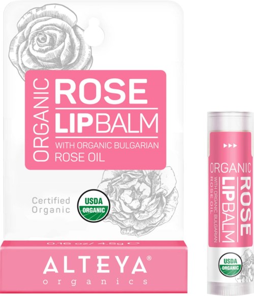 Pakkaus ja putki orgaanista bulgarialaista ruusun lip balmia, ruusukuvia, USDA-sertifioitu, pinkki pakkaus.