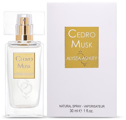 Eine klare Parfümflasche mit goldener Sprühkappe und weiße Box, beide beschriftet Cedro Musk von Alyssa Ashley.