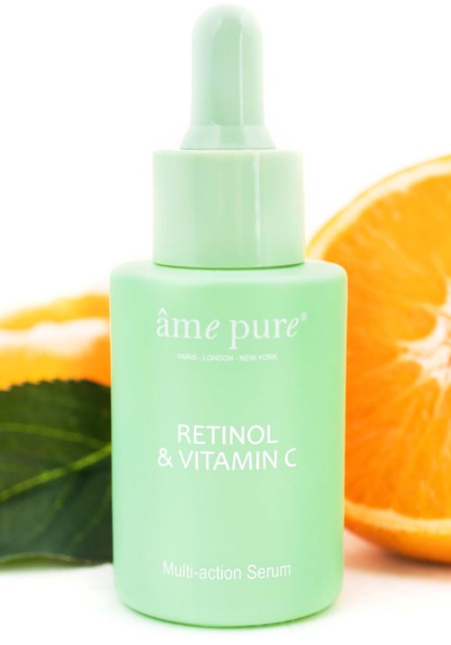 Eine hellgrüne Flasche mit Tropfer, beschriftet 'âme pure' und 'Retinol & Vitamin C'.