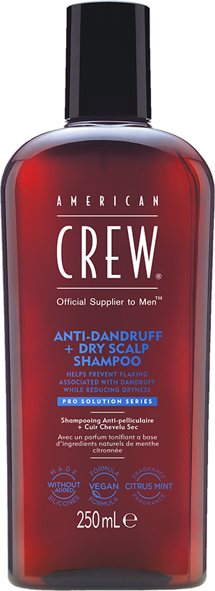 Een rode fles American Crew Anti-Head Schuppen en Droge Hoofdhuid Shampoo met zwart deksel, label beschrijft gebruik en ingrediënten.