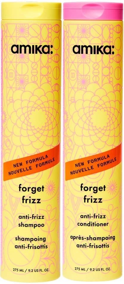 Kaksi pulloa Amika forget frizz anti-frizz shampoota ja hoitoainetta, keltainen ja pinkki pakkaus.