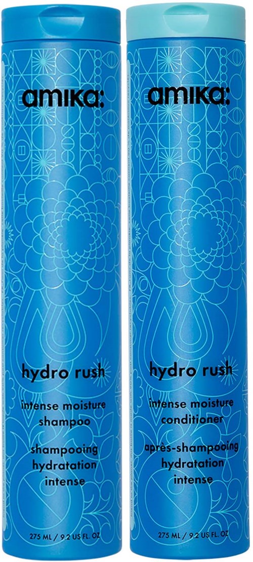Two blue bottles of Amika Hydro Rush shampoo and conditioner with geometric and floral designs.