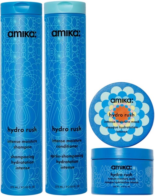 Three blue containers for hair care, a shampoo, conditioner, and hydration mask, all with decorative patterns and labels.