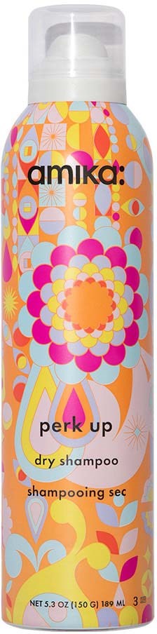 A colorful dry shampoo bottle with floral and geometric patterns, labeled 'amika: perk up dry shampoo' in various colors.
