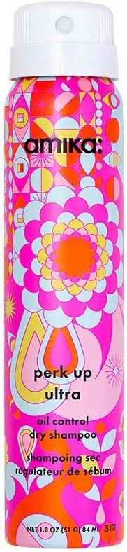 A tall bottle with colorful, floral and geometric patterns, labeled as Amika Perk Up Ultra dry shampoo.