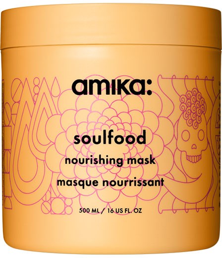 En rund orange behållare för en närande hårmask med rosa linjeteckningar och en skalleillustration.