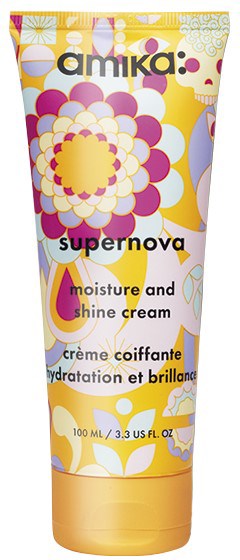 Colorful tube of Amika Supernova moisture and shine cream with floral and abstract designs.