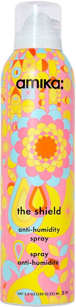 Colorful design with a large flower, text names the product as Amika the shield anti-humidity spray.