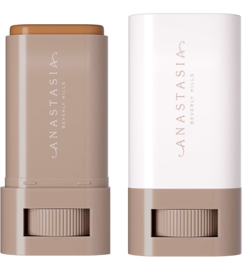 Zwei beige Behälter mit 'Anastasia Beverly Hills' -Aufdruck, wahrscheinlich Make-up-Produkte, mit Übertragsdeckel und einfachem Branding.