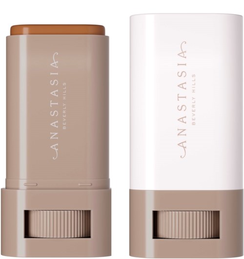 Beige und weiße Behälter mit braunem Deckel und schiebbarem Boden, beschriftet 'Anastasia Beverly Hills' für ein Kosmetikprodukt.