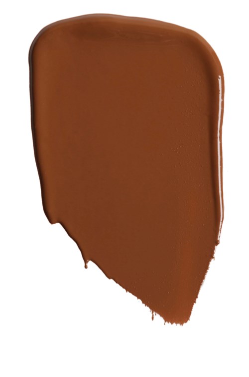 Ein braune Fleck von Farbe oder Make-up, rund oben und leicht ungleich unten.