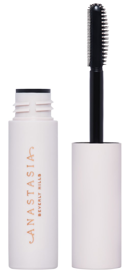 En vit mascaratub med orange logga och en svart borste. Borsten har borst för fransar.