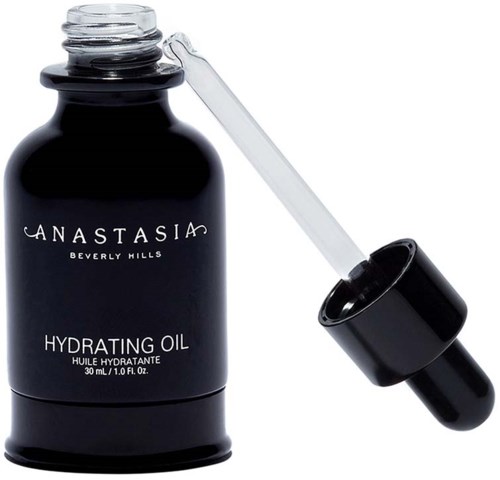Een zwart flesje met 'Hydrating Oil' erop en druppelaar op de dop.