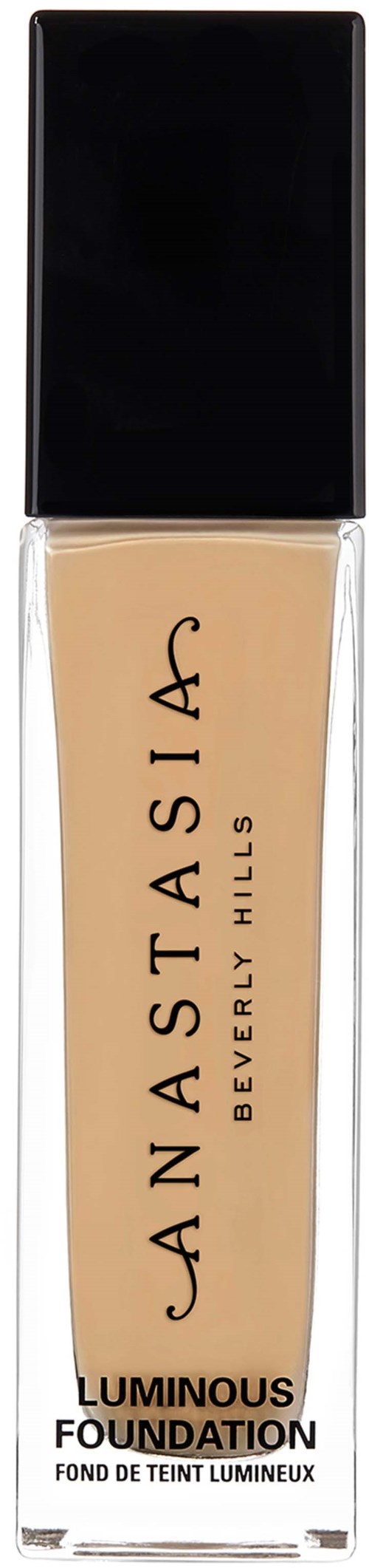 Anastasia Beverly Hills hehkuva meikkivoidepullon mustalla korkilla ja läpinäkyvällä lasilla, jossa vaaleanruskea neste.