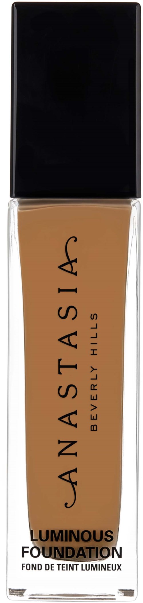En flaska med beigefärgad flytande foundation med svart lock och etikett med texten Anastasia Beverly Hills Luminous Foundation.