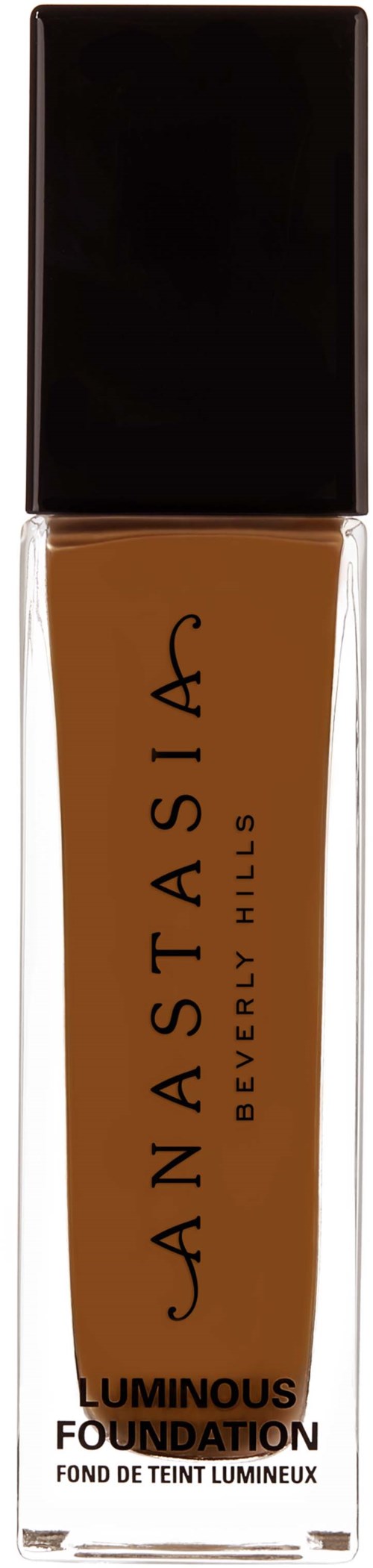 En flaska av foundationsmink från Anastasia Beverly Hills har ett svart lock och brun vätska inuti.