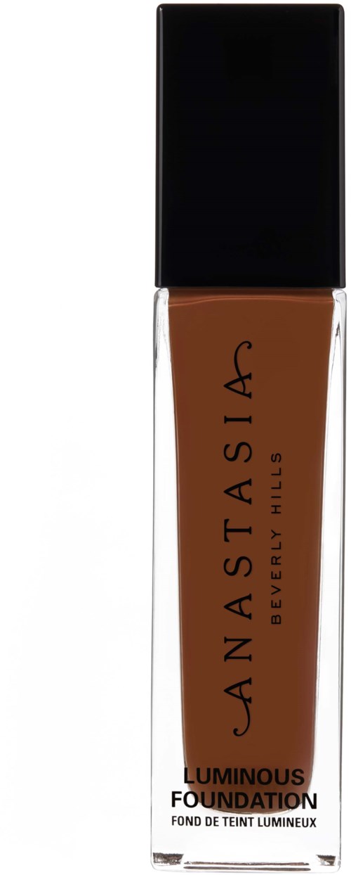 Pullon ruskeaa nestemäistä_value_ perustustuotteesta, jossa on musta kansi, nimeltään Anastasia Beverly Hills Luminous Foundation.