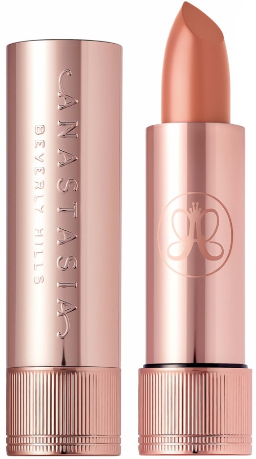 Ein roségoldener Lippenstift mit verziertem Gehäuse, geöffnet, um den Lippenstift zu zeigen.