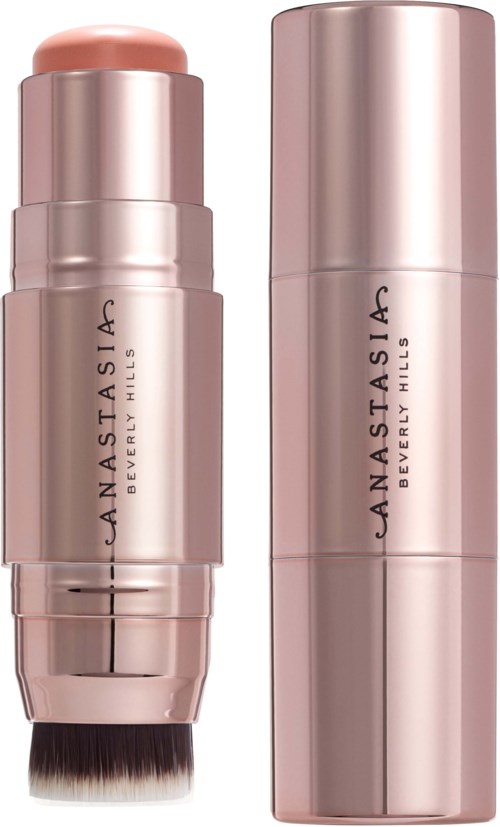 Zwei roségoldene Hautpflege- oder Make-up-Flaschen, eine geöffnet mit Pinsel, Marke 'Anastasia Beverly Hills.'