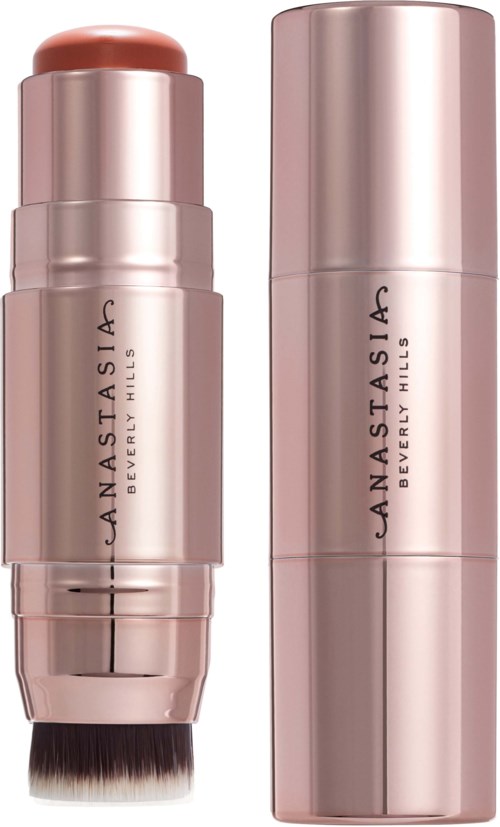 Vaaleanpunainen pyöreä meikkituote, jossa on musta sivellin alaosassa. Siinä lukee 'Anastasia Beverly Hills'.