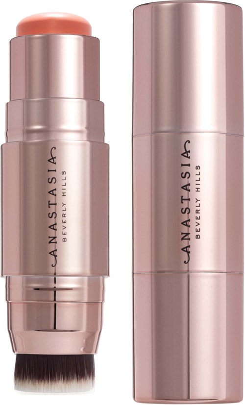 Twee huidverzorgingsflessen, een met pomp en borstel, roségoudkleurig, gelabeld Anastasia Beverly Hills.