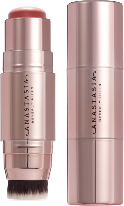Zwei roségoldene zylindrische Behälter, einer mit abgerundetem Deckel, der andere länger und schmaler, Marke Anastasia Beverly Hills.