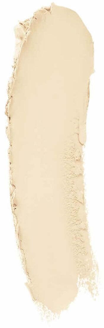 En lång smet av beige smink med korniga kanter och slät mitt.