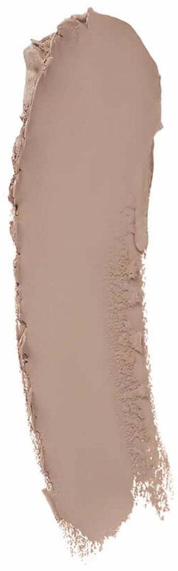 Een veeg beige of lichtbruin make-up of crème met ruwe randen op een zwarte achtergrond.