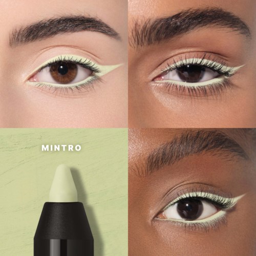Three models with bold eye makeup and white eyeliner, and a bottle of mint green cosmetic product.