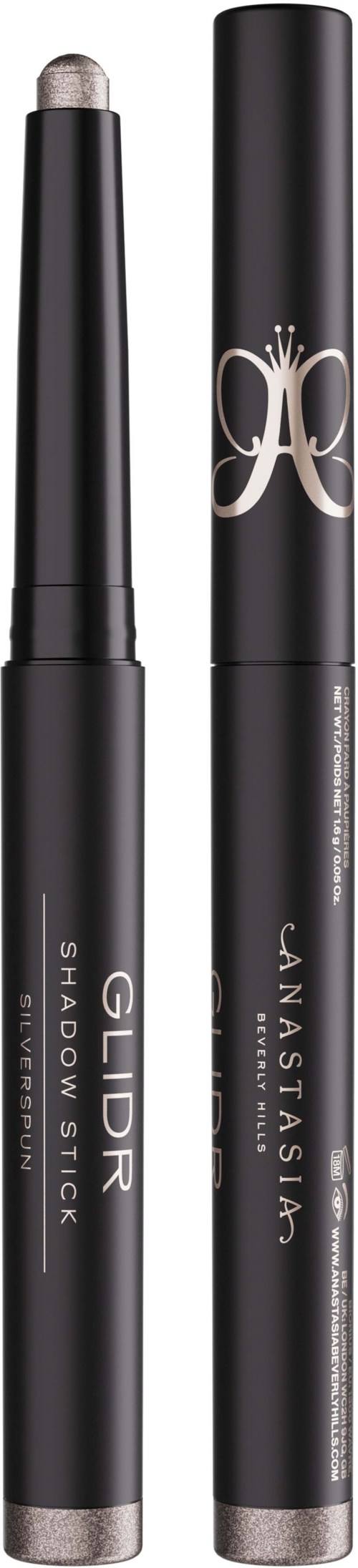 Zwei schwarze Kosmetikstifte mit silbernen Akzenten, eines beschriftet mit 'GOLD SHADOW STICK' und das andere mit einem dekorativen Logo.