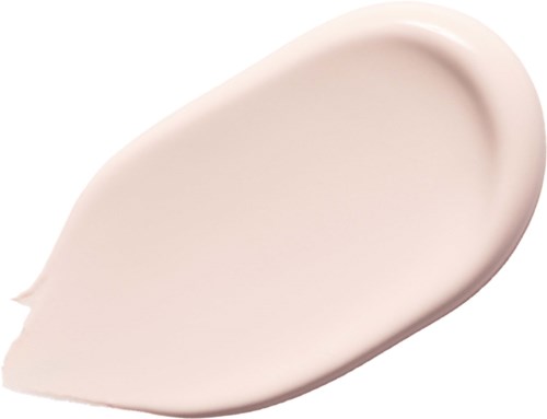 Eine beige, cremige Substanz mit glatten, abgerundeten Kanten, verteilt in einer Tränenform.