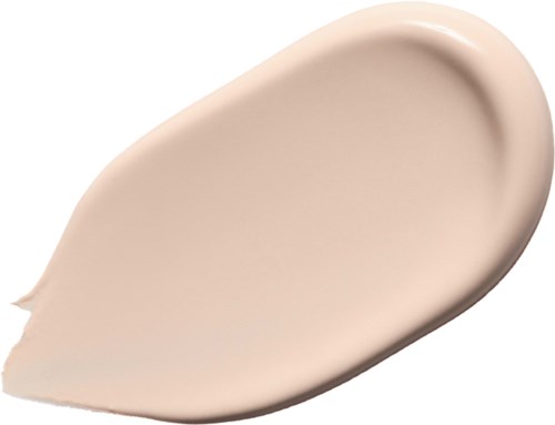 Cremefarbene Lotion oder Foundation, die auf eine Oberfläche aufgetragen wurde.