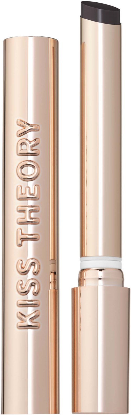 Lipglosstube i blank gullfarge med KISS THE STORY skrevet vertikalt.