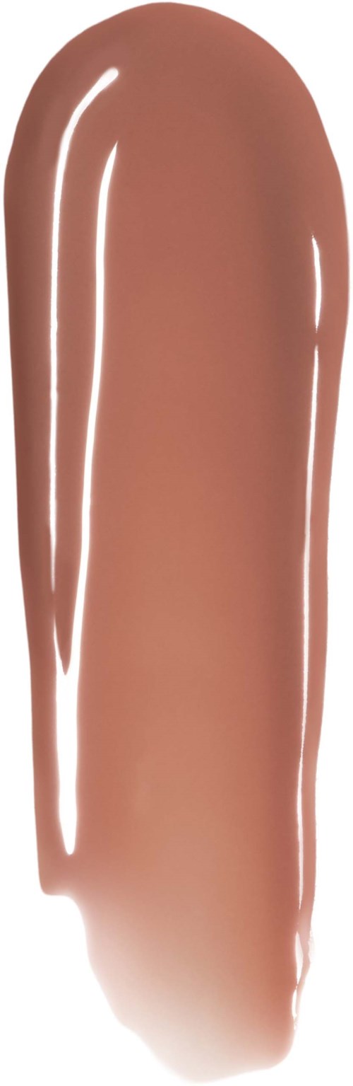 Kremaktig beige væske spredt i en vertikal bevegelse med blank overflate.