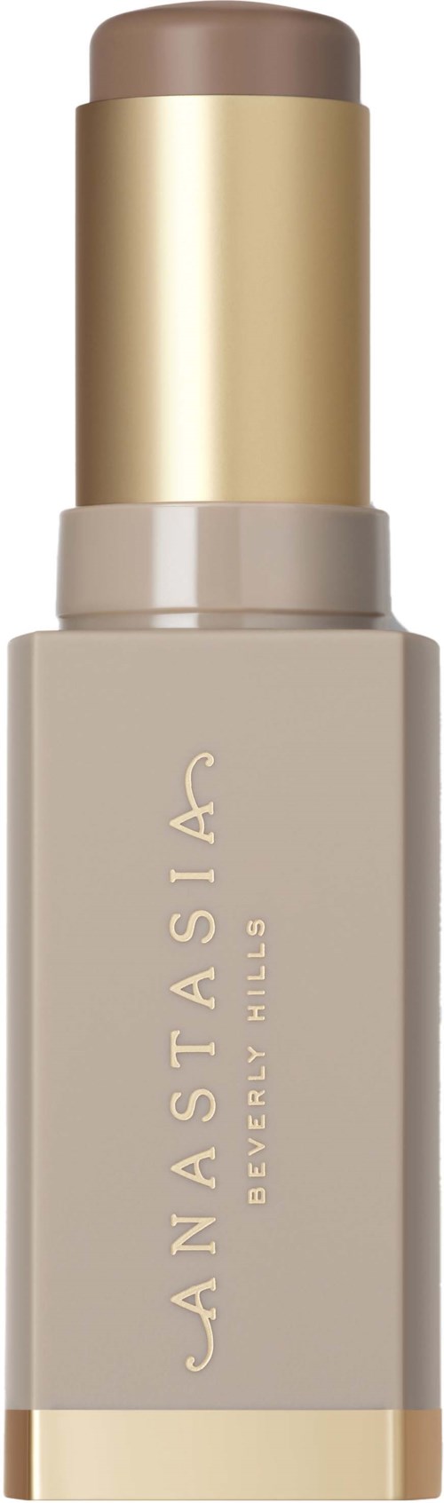 Een beige tube met gouden dop, gemarkeerd met Anastasía Beverly Hills, waarschijnlijk een schoonheidsproduct.