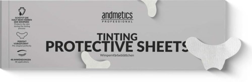 Box of tinting protective sheets with some sheets sticking out, labeled 'andmetics professional' and 'tinting protective sheets.'