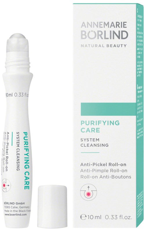 Een witte roll-on fles met dop naast een teal en witte doos met label 'Purifying Care' en 'System Cleansing.'