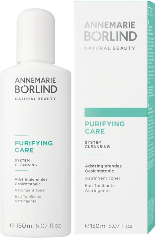 Een witte fles en doos met tekst die Annemarie Borlind Reinigende Zorg toner voor gezichtstoediening adverteren.