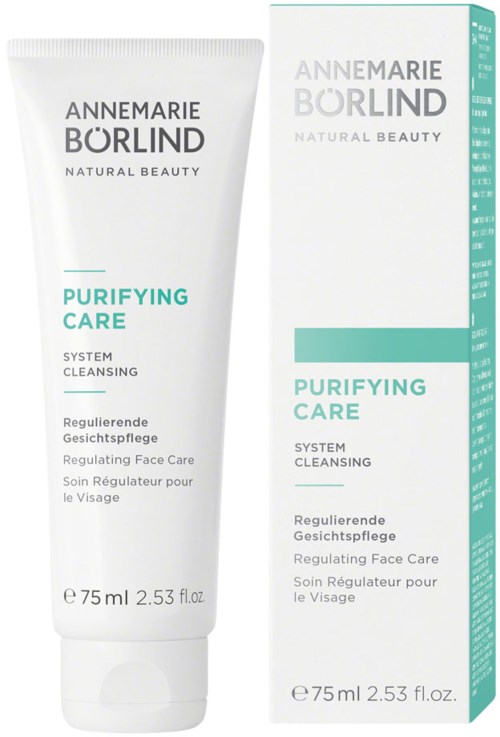 Een tube en doos van Annemarie Börlind Purifying Care voor gezicht reinigen, met eenvoudig wit en teal ontwerp.