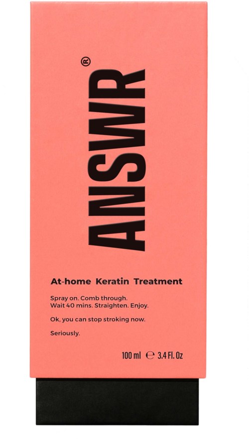 Eine rosa Verpackung mit schwarzem fettem Text 'ANSWER', ein Keratin-Haarpflegeprodukt.